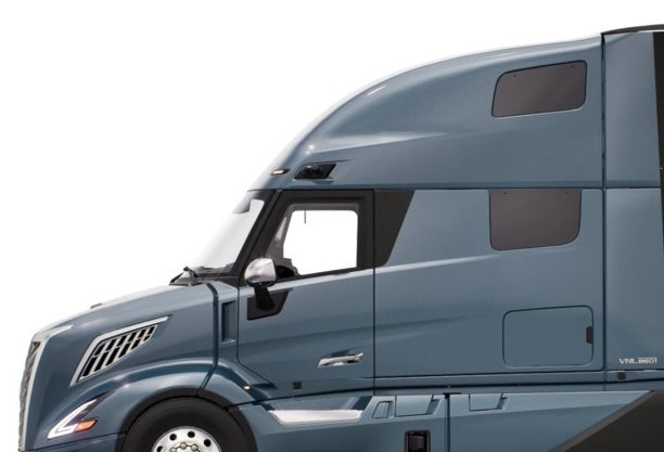 Side view of the all-new Volvo VNL big truck in Coastal Mist colour