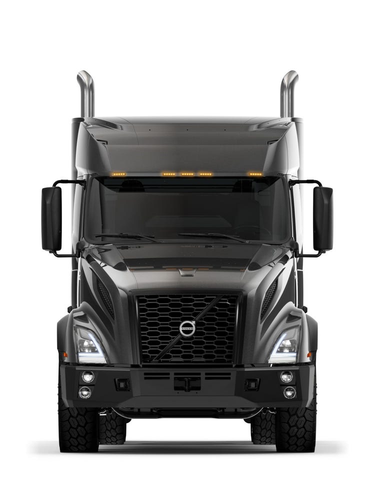 A front-facing view of the black Volvo VNX semi truck, designed for heavy-duty performance