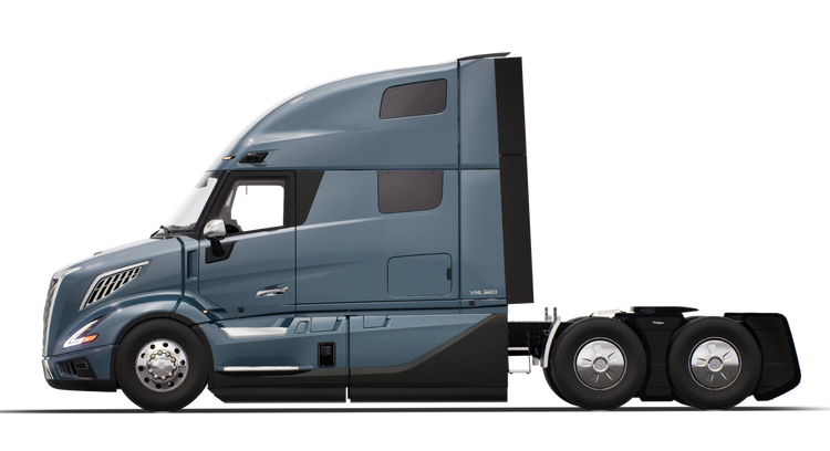 A coastal mist Volvo VNL semi truck shown in profile, highlighting its modern cab design, integrated sleeper, and polished wheels.