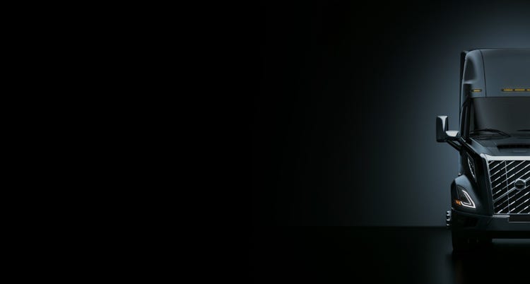 Front view of the All-New Volvo VNL truck in North America against a dark background.