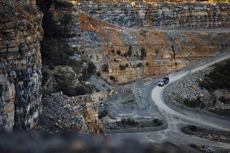 A drone view of the Volvo VNX driving on a rocky road.