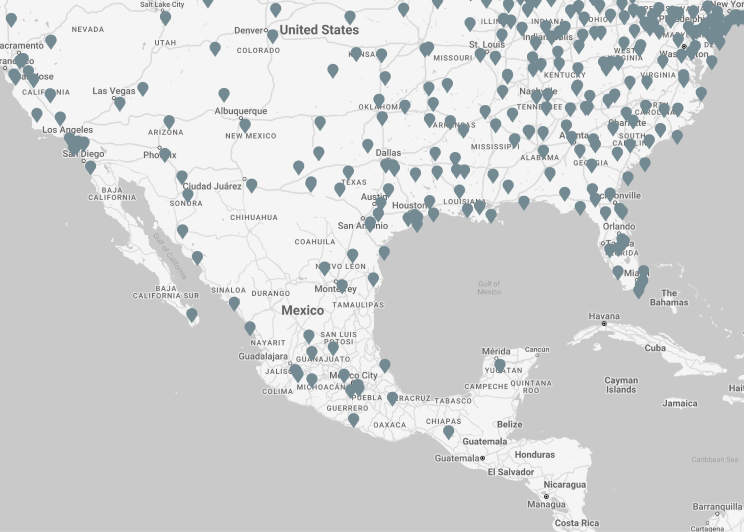 A map of North America marked with numerous pins indicating Volvo Trucks dealer locations across the United States, Canada, and Mexico.
