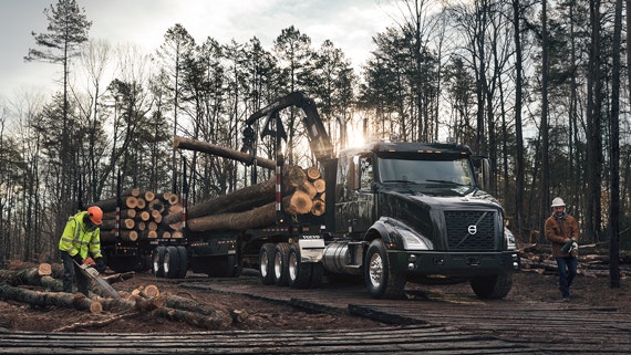 The Volvo VNX truck navigating a rugged terrain.