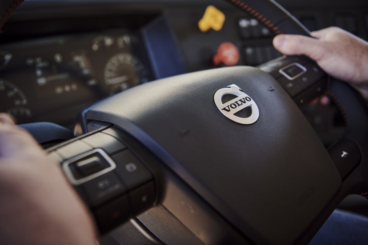Close-up of the Volvo steering wheel inside a VHD truck, with integrated controls for enhanced driver convenience.