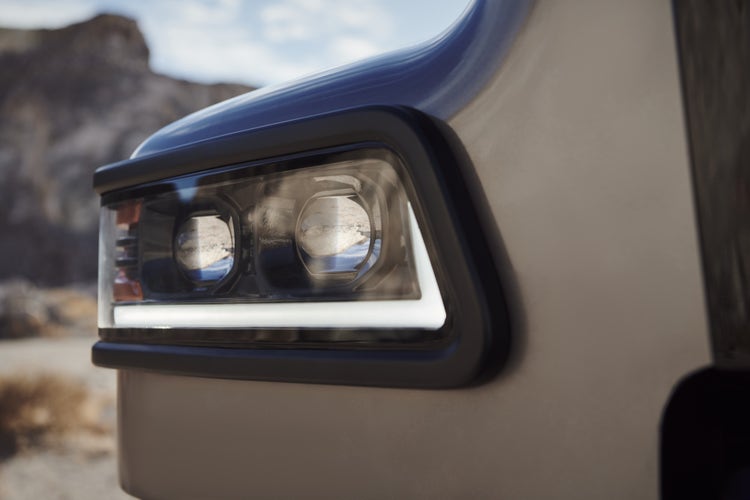 Close-up of the LED headlight on a Volvo VHD truck, showcasing its modern design and durability for improved visibility in tough environments.