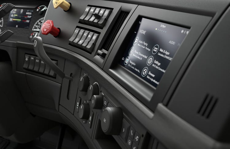 Close-up of the Volvo VNR truck's dashboard,