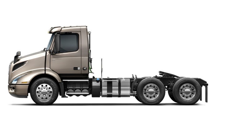 Side profile view of a Volvo VNR 300 truck.