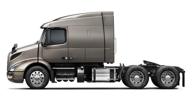 Side profile view of a Volvo VNR 640 truck.